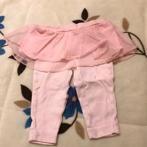 Pink leggings with tutu.